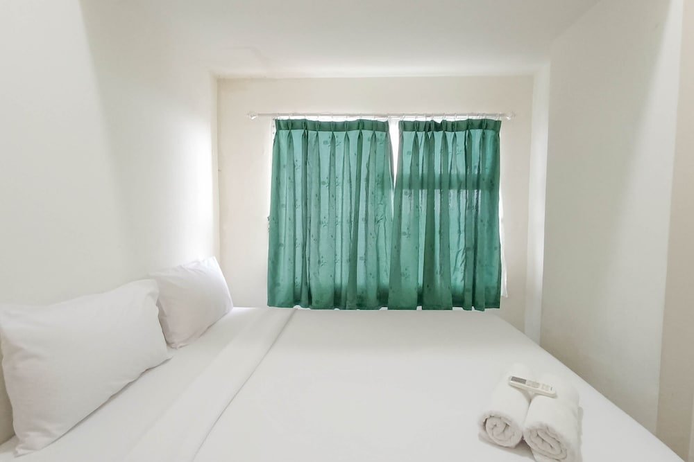 nice and homey 2br at vida view makasar apartment