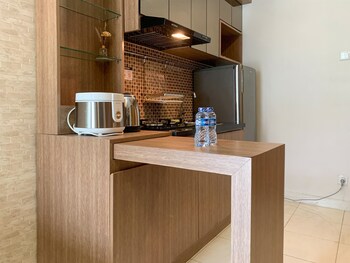 comfort and tidy 2br at cinere bellevue suites apartment