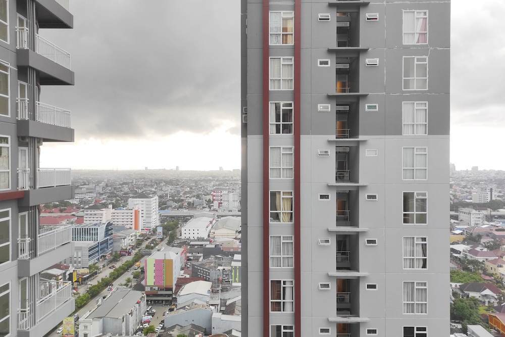 simply homey studio at vida view apartment