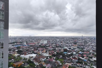 simply homey studio at vida view apartment