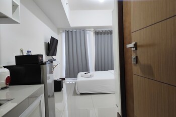 simply homey studio at vida view apartment