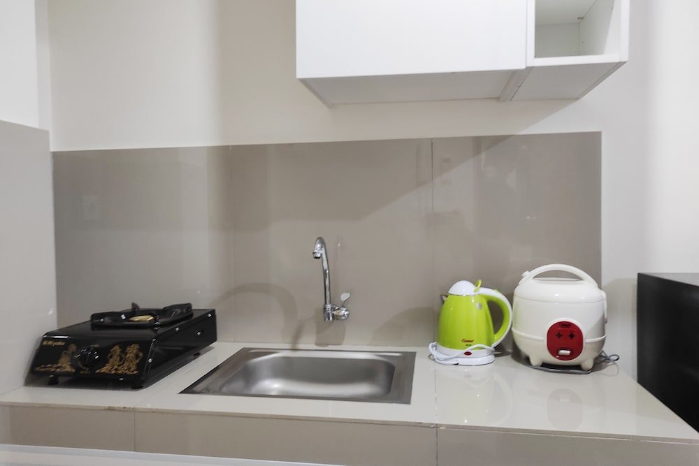 simply homey studio at vida view apartment