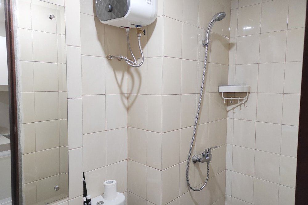 simply homey studio at vida view apartment