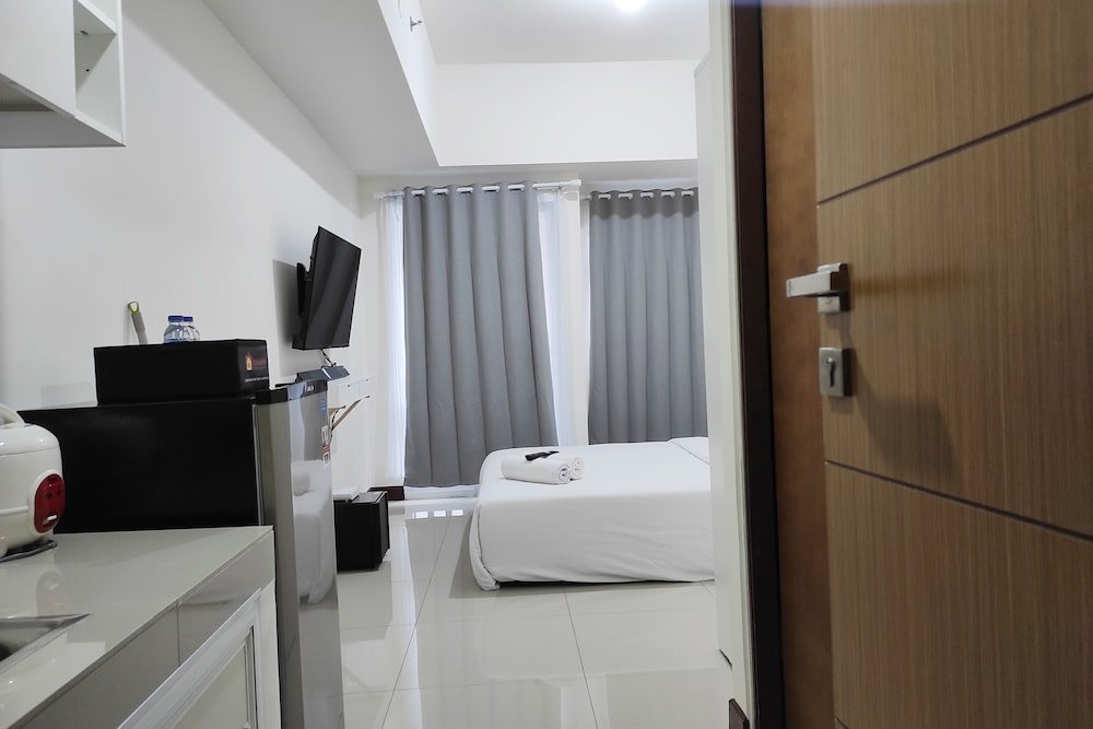 simply homey studio at vida view apartment