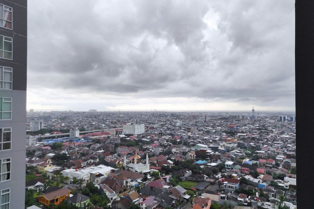 simply homey studio at vida view apartment