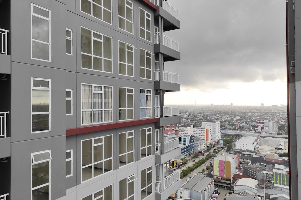 simply homey studio at vida view apartment