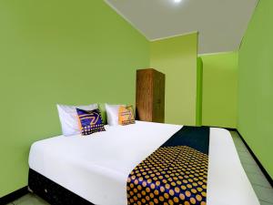 spot on 91116 pelangi residence syariah