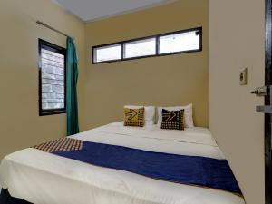 spot on 91116 pelangi residence syariah