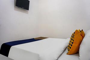 spot on 90928 wisma asri putra syariah