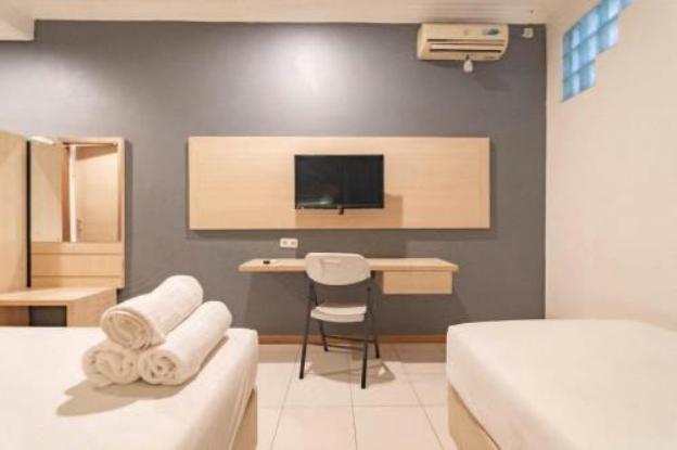 reddoorz hotel arimbi dewi sartika baru