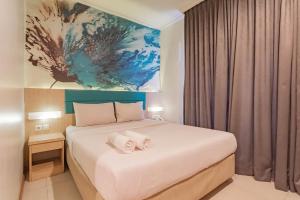 reddoorz hotel arimbi dewi sartika baru