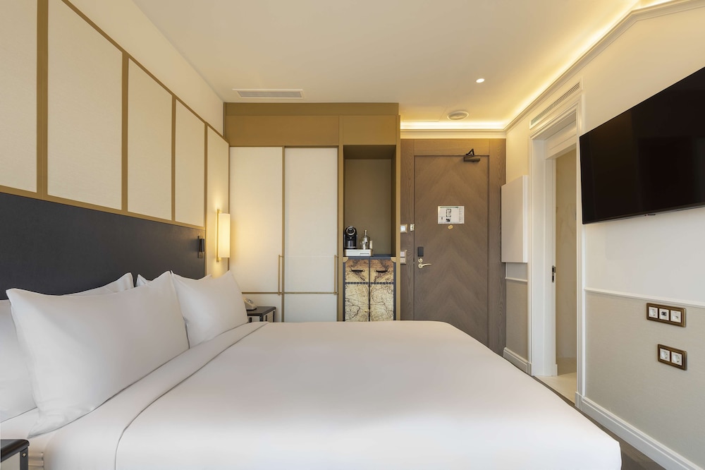 the emerald house lisbon curio collection by hilton