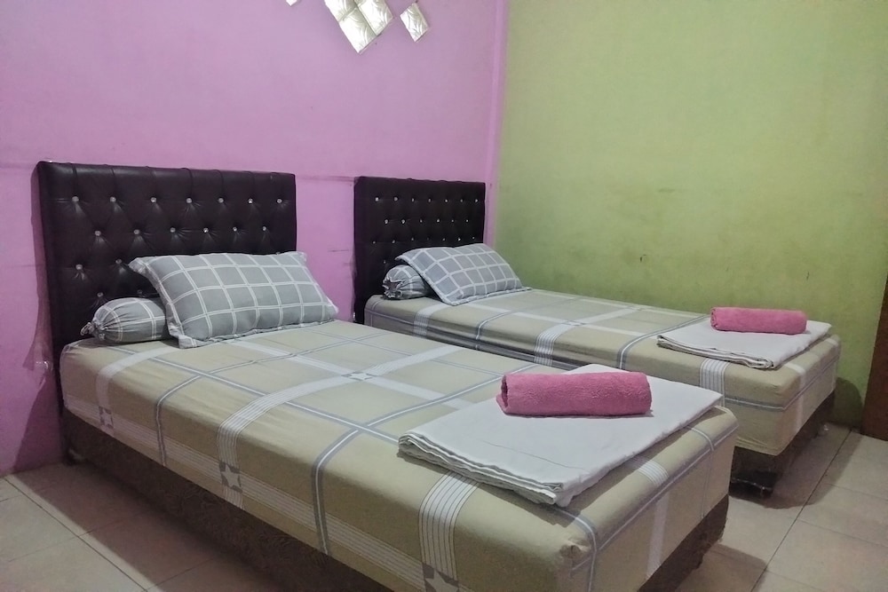 home stay kembar syariah redpartner