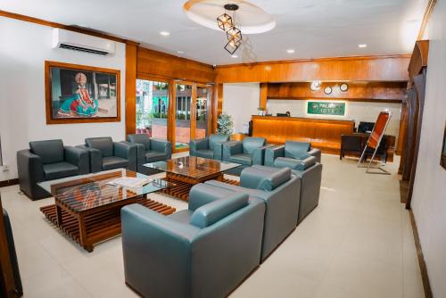 hotel palmyra grand inn