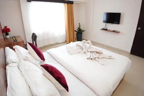 hotel palmyra grand inn