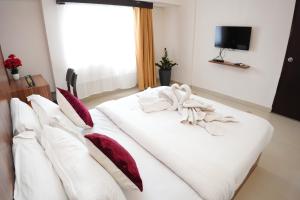 hotel palmyra grand inn