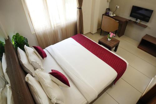 hotel palmyra grand inn