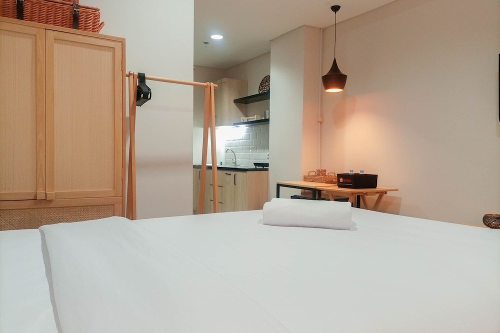 cozy studio room at patraland amarta apartment