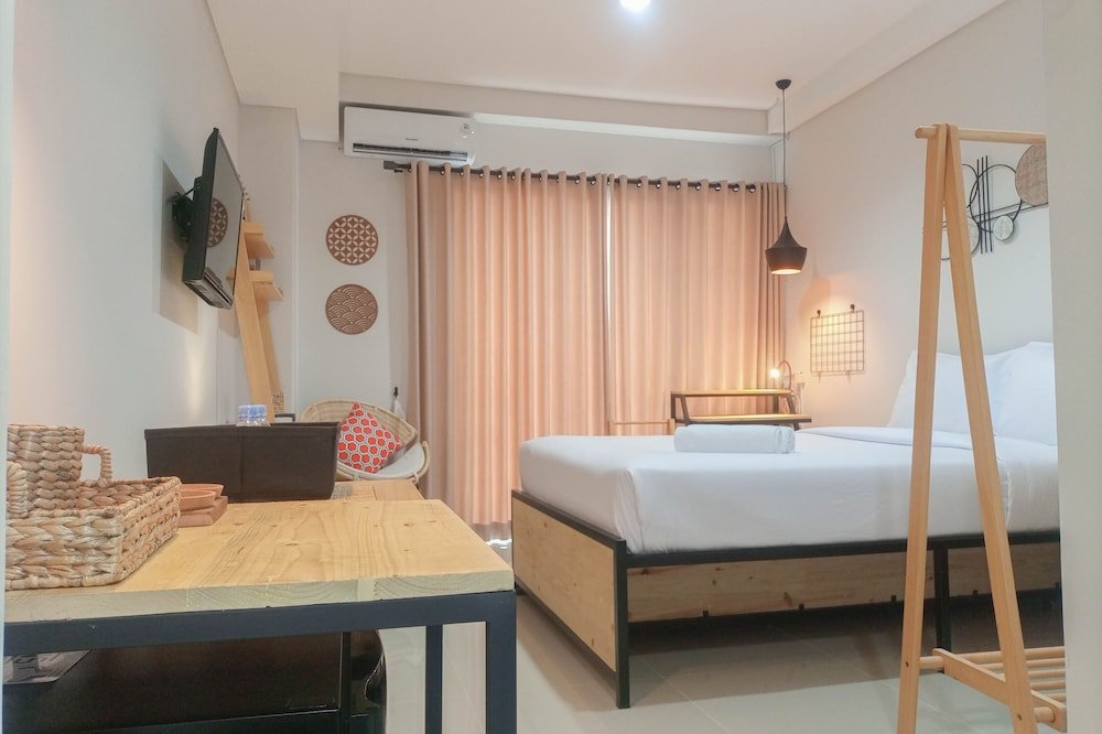 cozy studio room at patraland amarta apartment