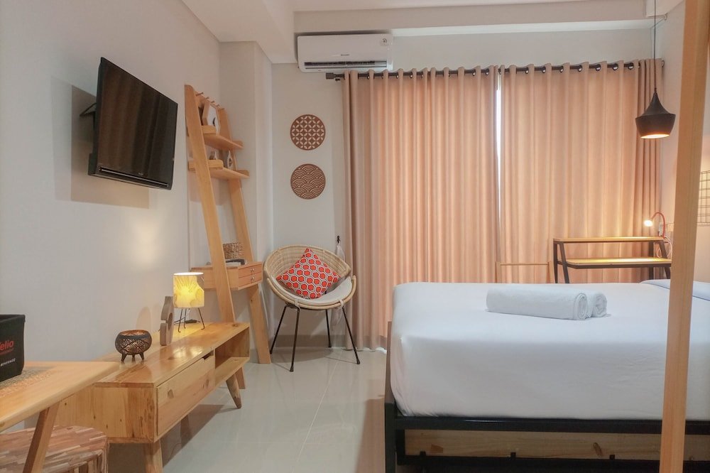 cozy studio room at patraland amarta apartment