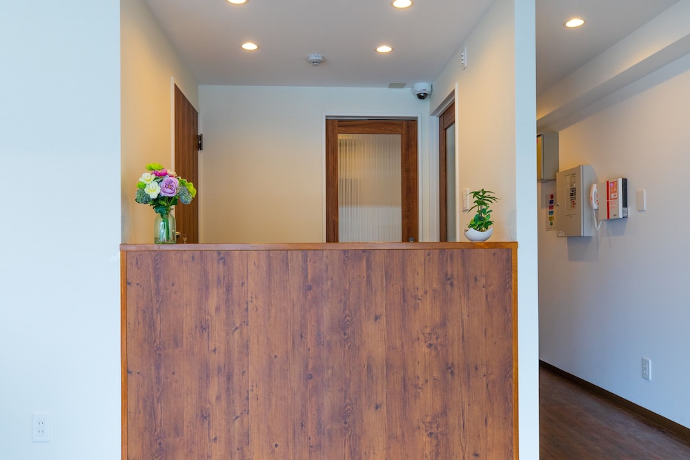 mr kinjo in front of manza beach