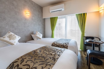 mr kinjo in front of manza beach