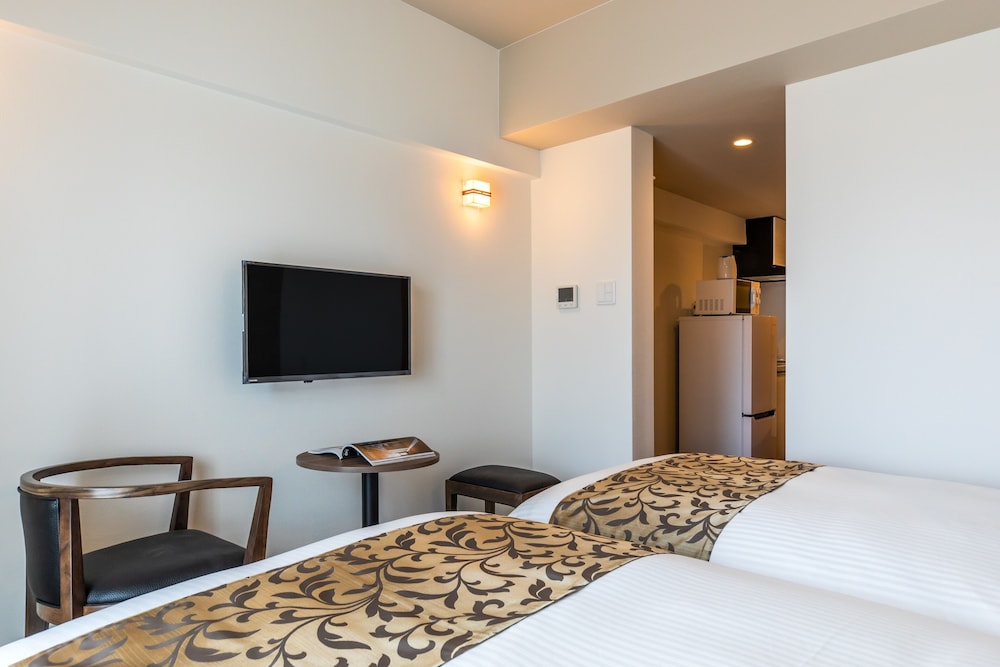 mr kinjo in front of manza beach