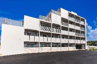 mr kinjo in front of manza beach