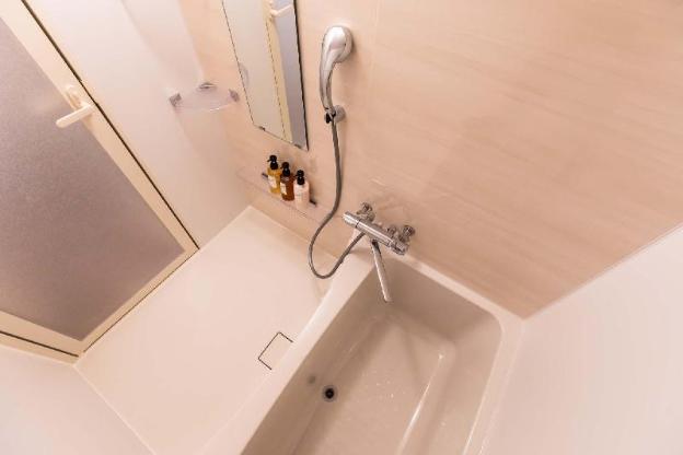 mr kinjo in front of manza beach