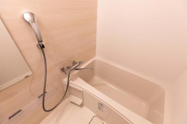 mr kinjo in front of manza beach