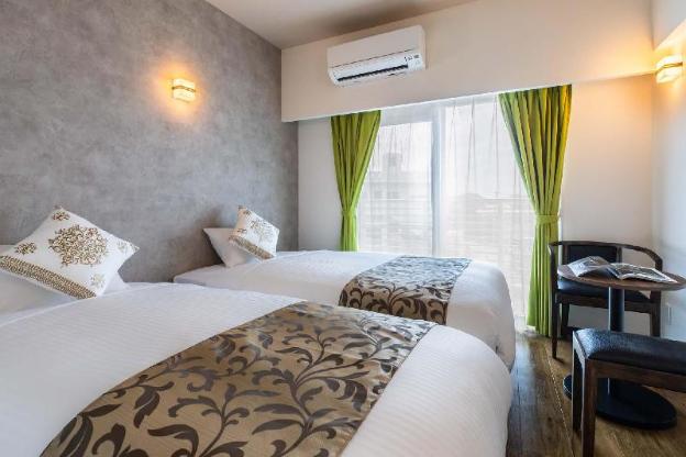 mr kinjo in front of manza beach