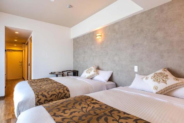 mr kinjo in front of manza beach