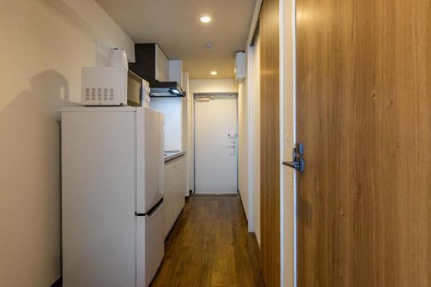 mr kinjo in front of manza beach