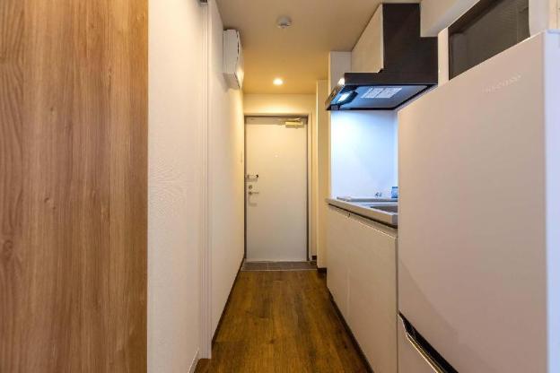 mr kinjo in front of manza beach