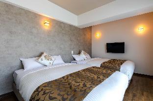 mr kinjo in front of manza beach