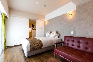 mr kinjo in front of manza beach