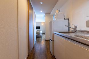 mr kinjo in front of manza beach