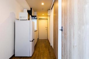 mr kinjo in front of manza beach