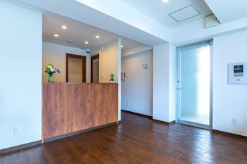 mr kinjo in front of manza beach