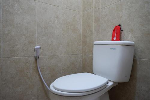 reddoorz near millenium waterpark palu