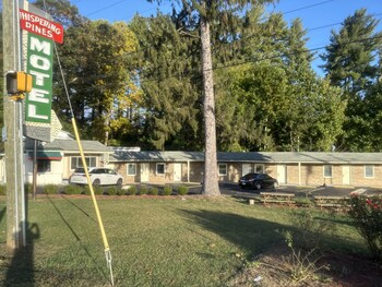 whispering pines motel