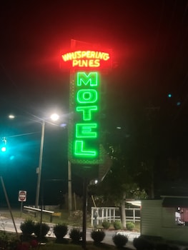 whispering pines motel