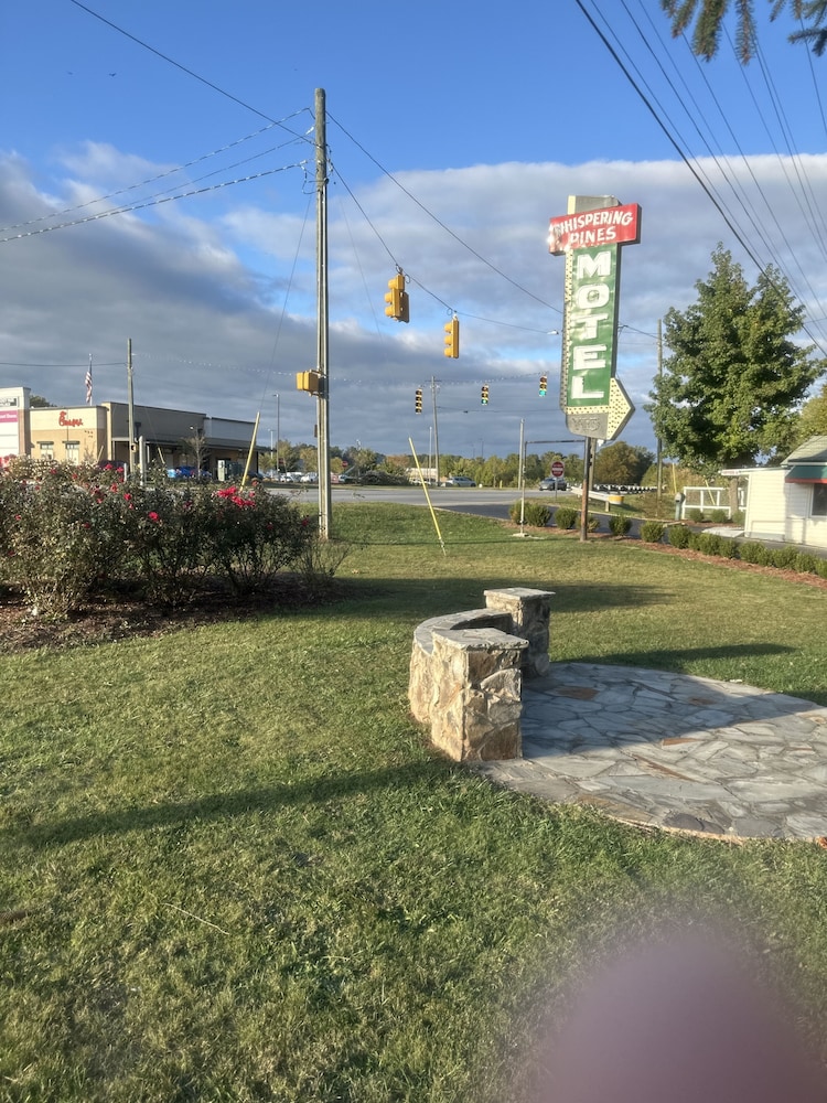 whispering pines motel