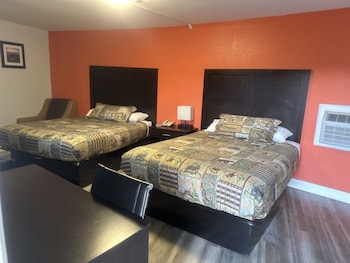 whispering pines motel