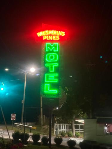 whispering pines motel