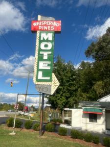 whispering pines motel