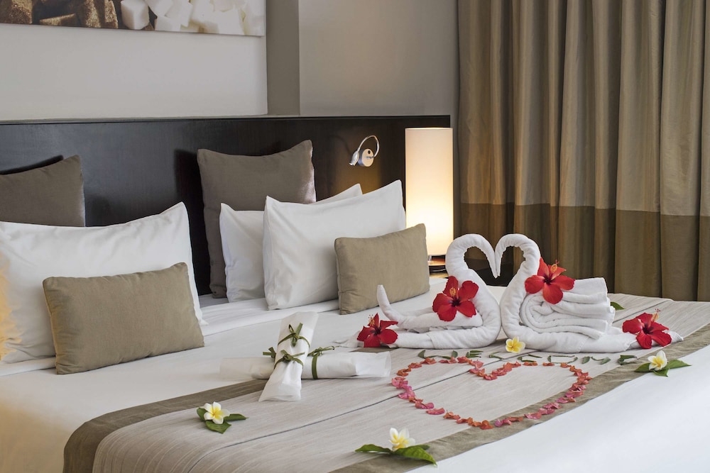 crystals beach resort belle mare a member of radisson individuals