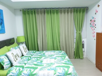 family condo by ia at azure urban resort residences
