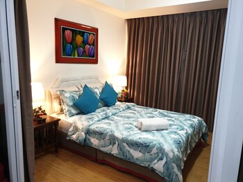 family condo by ia at azure urban resort residences