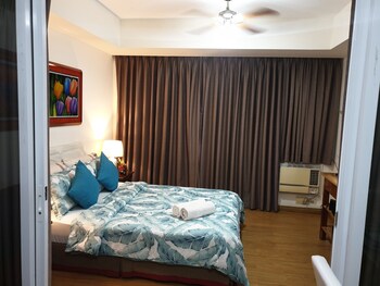 family condo by ia at azure urban resort residences